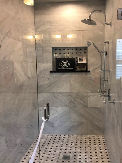 black & white decorative tiled glam shower