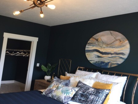 Mid century modern bedroom with sputnik light and blue marbled agate wall art